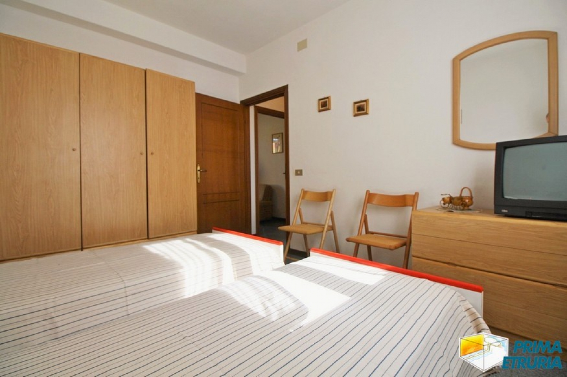 TRILOCALE CON POSTO AUTO- ZONA TOMBOLO -