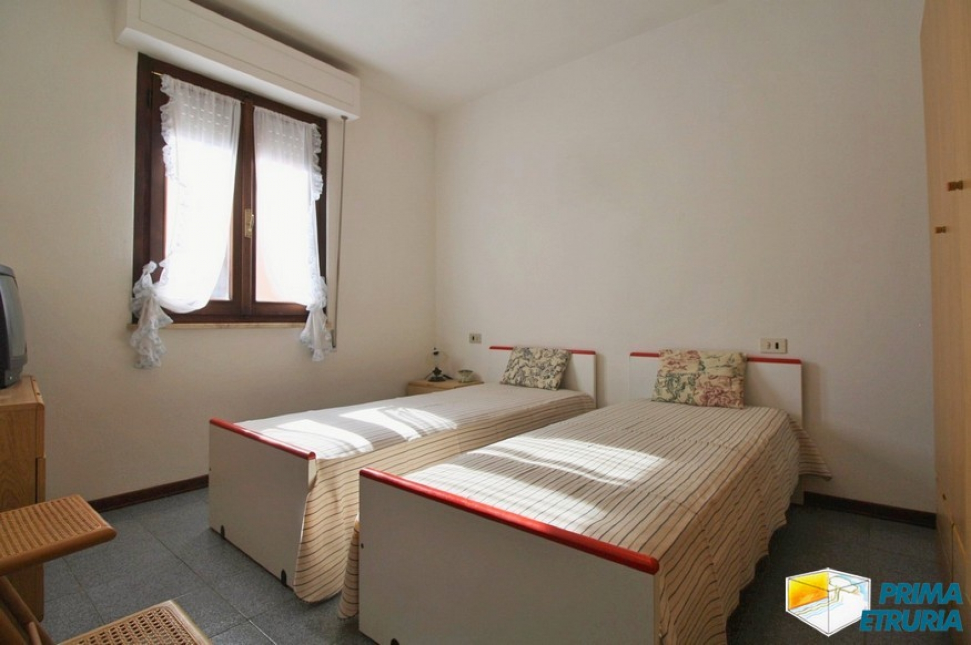 TRILOCALE CON POSTO AUTO- ZONA TOMBOLO -