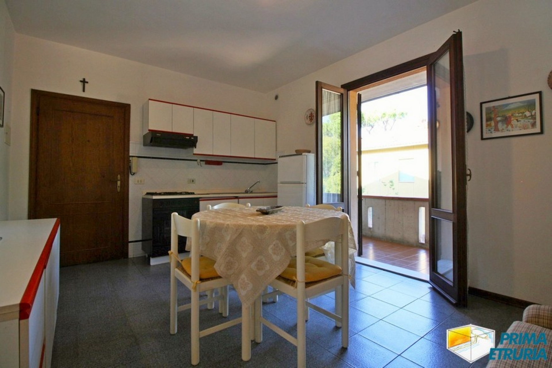 TRILOCALE CON POSTO AUTO- ZONA TOMBOLO -