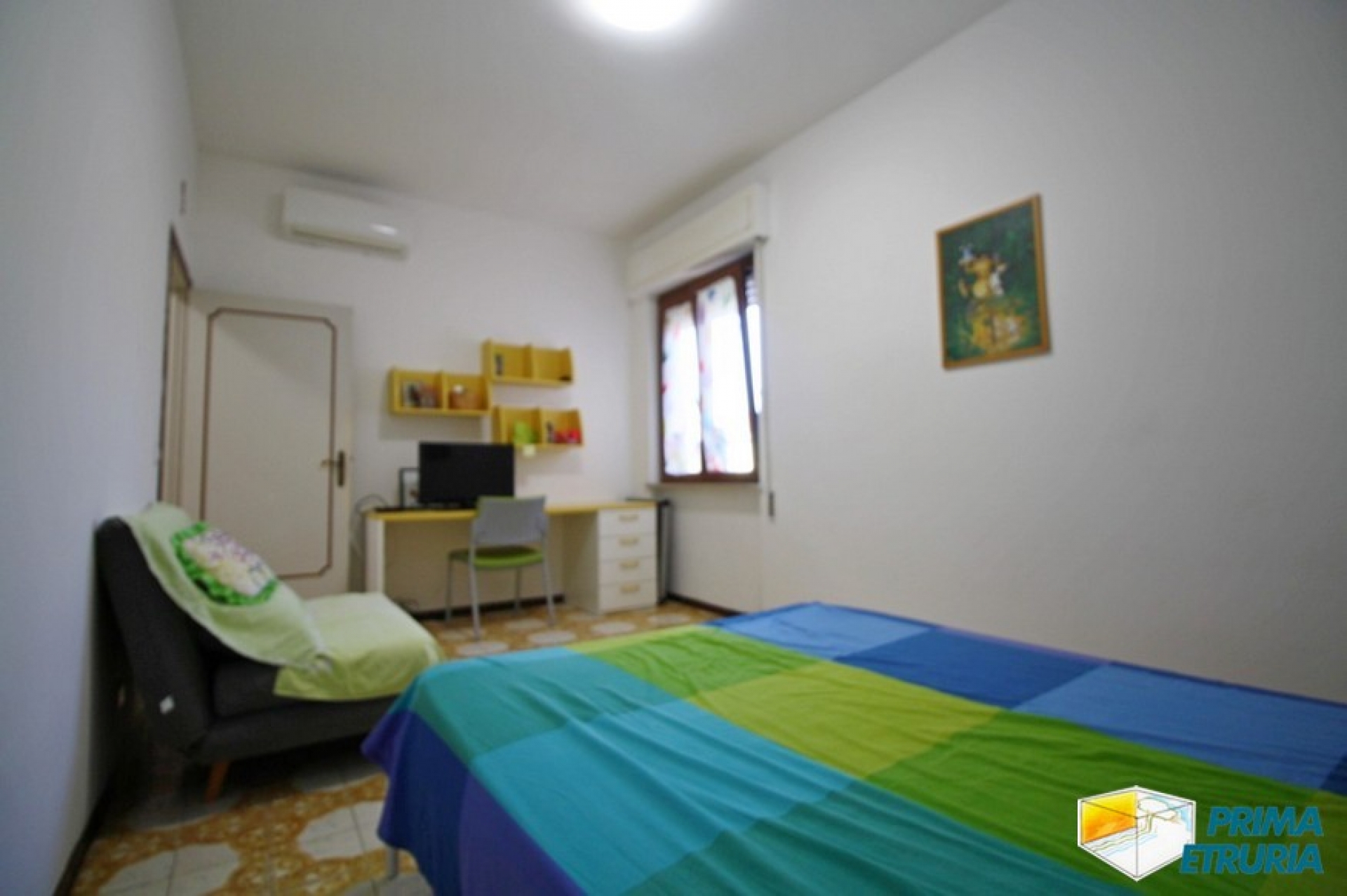 AMPIO TRILOCALE CON GARAGE E POSTO AUTO - ZONA CENTRO -