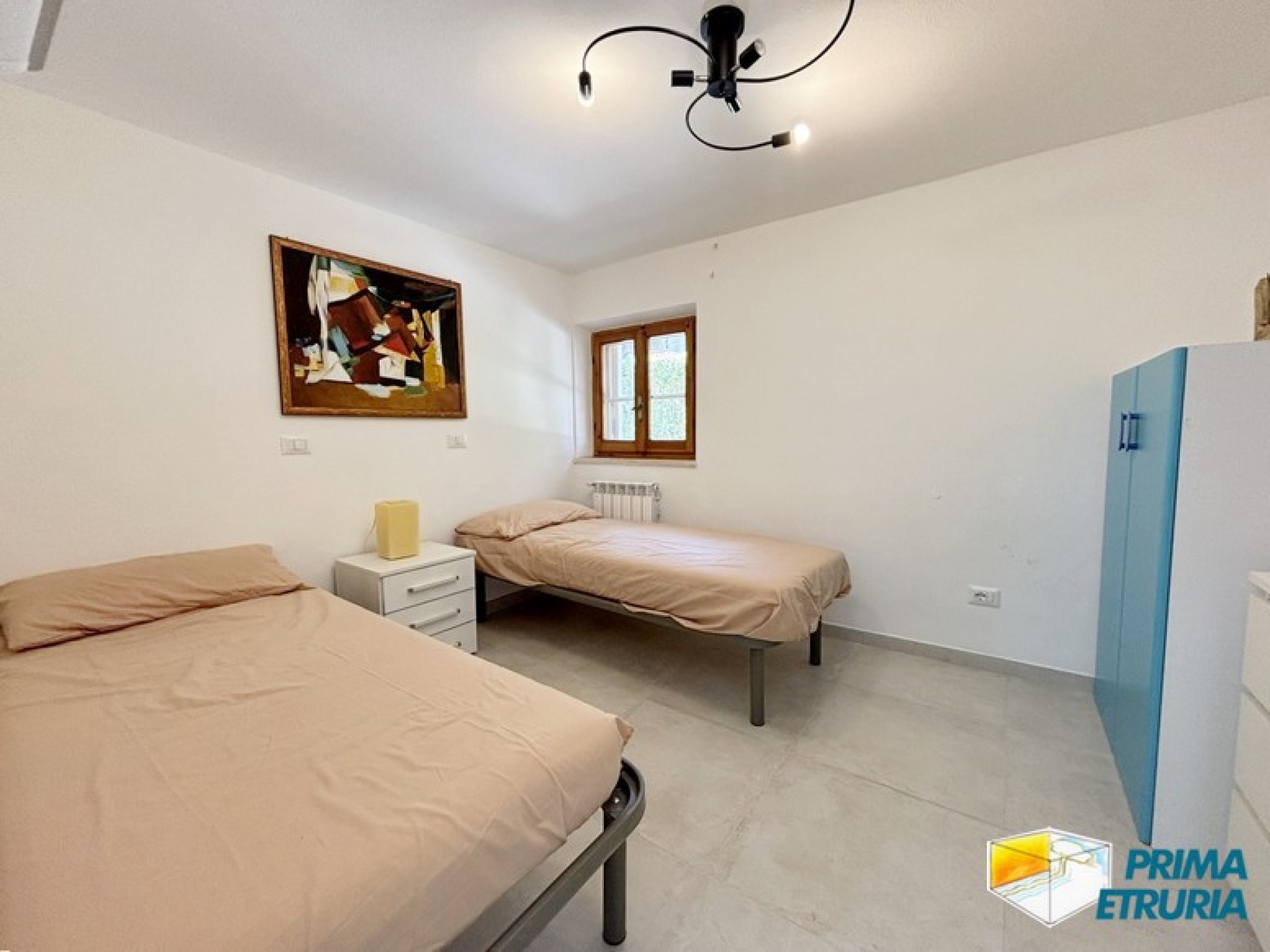 Trilocale rinnovato con giardino privato immerso nella pineta - ZONA CENTRO -
