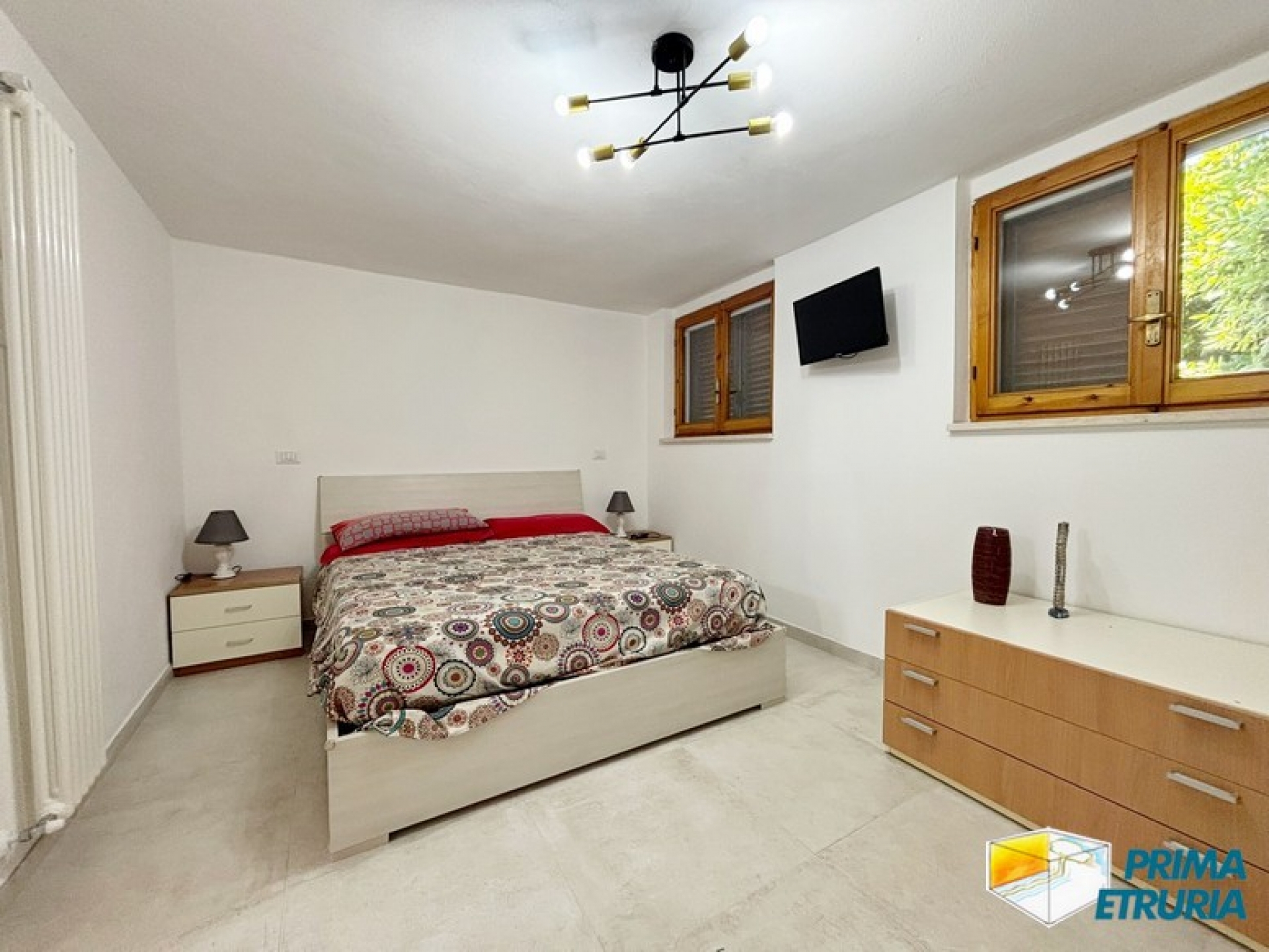 Trilocale rinnovato con giardino privato immerso nella pineta - ZONA CENTRO -